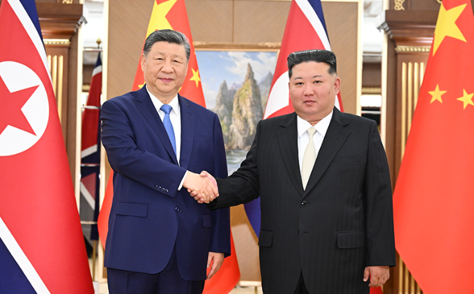 习近平同金正恩举行会谈